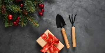 Christmas,And,New,Year,Composition.,Garden,Tools,,Shovel,And,Rake,