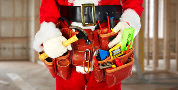 Santa,Worker,With,A,Tool,Belt,Construction,Background.
