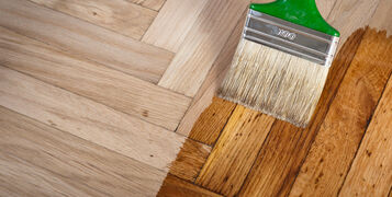 Varnish,Brush,Strokes,On,A,Wooden,Floor